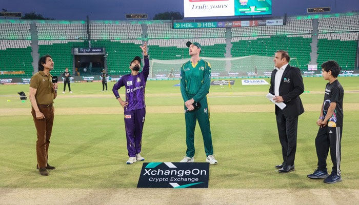 Quetta Gladiators captain Saud Shakeel (centre) flips the coin as Multan Sultans Ashton Turner (right) makes the call at the toss for their PSL 11 match at the Gaddafi Stadium in Lahore on April 5, 2026. — PSL