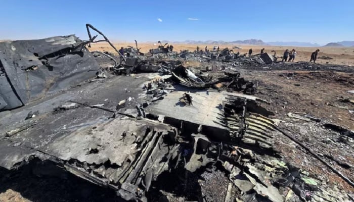 An image released on April 5, 2026, and obtained from social media appears to show wreckage of an American aircraft and a helicopter rotor in Isfahan, Iran, which forensic imagery analyst William Goodhind said is consistent with a US MC‑130J or HC‑130J, amid the US-Israeli conflict with Iran.— Reuters