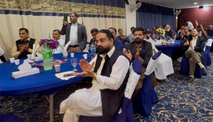 Participants listen and clap as speakers express readiness to take responsibility and support the UAE during the event.— Reporter