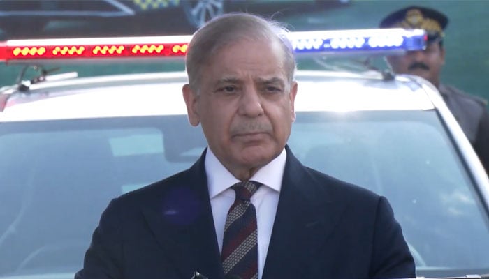 PM Shehbaz addresses a ceremony in Islamabad for the provision of eco-smart EVs to the Capital Traffic Police. — X/@GovtofPakistan