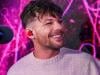 Louis Tomlinson fans light up arena during emotional Prague show