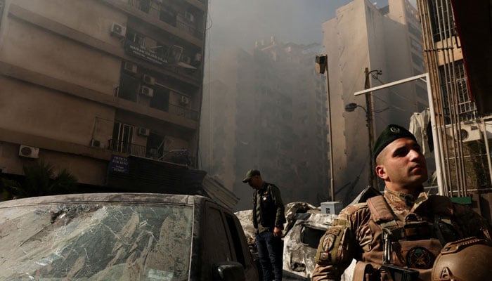 A soldier looks on at the site of an Israeli strike, in Al-Mazraa in Beirut, Lebanon, April 8, 2026. — Reuters