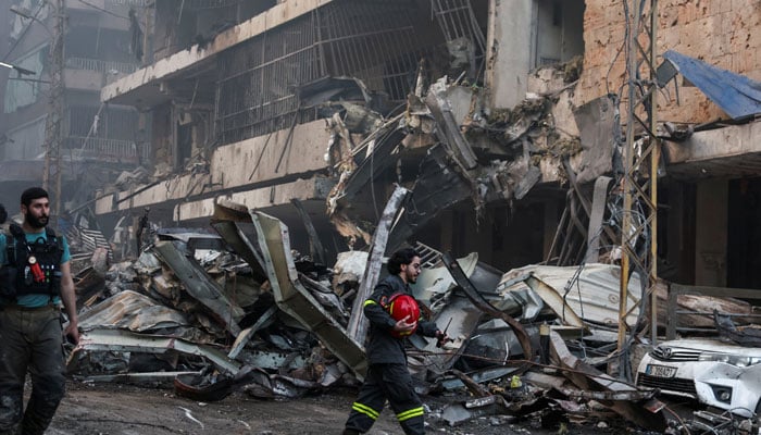 An emergency responder works at the site of an Israeli strike, in Al-Mazraa in Beirut, Lebanon, April 8, 2026. — Reuters