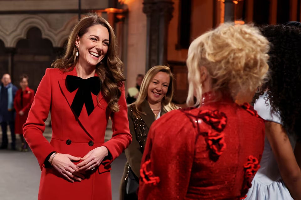 Kate Middleton speaking to Paloma Faith at Christmas carol service in 2024