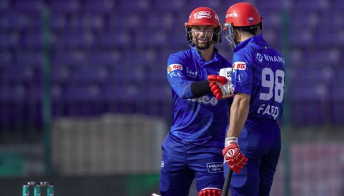 Islamabad Uniteds Devon Conway (left) and Mohammad Faiq share a fist bump during their Pakistan Super League (PSL) 11 match against Lahore Qalandars at the National Bank Stadium in Karachi on April 9, 2026. — PSL