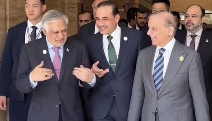 (From left to right) Deputy Prime Minister Ishaq Dar, Chief of Defence Forces and Chief of Army Staff Field Marshal Asim Munir and Prime Minister Shehbaz Sharif. — X/ @AnsarAAbbasi/File