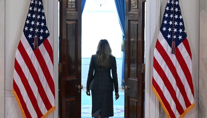 US First Lady Melania Trump departs after speaking in the Cross Hall of the White House in Washington, DC, US, on April 9, 2026. — AFP