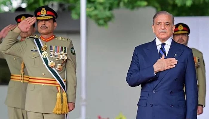Prime Minister Shehbaz Sharif and Chief of Army Staff Asim Munir review a passing out parade at the Pakistan Military Academy (PMA) Kakul, in Abbottabad on April 26, 2026. — AFP