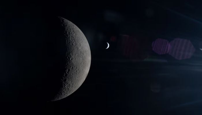 Seen from behind the Moon during Artemis II, the Moon and Earth align in the same frame, each partially illuminated by the Sun, photographed by the Nasa Artemis II crew from the Orion spacecraft during the lunar flyby mission, April 6, 2026. — Reuters