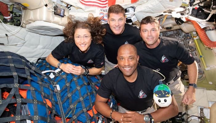 The Nasa Artemis II crew, Mission Specialist Christina Koch, Mission Specialist Jeremy Hansen, Commander Reid Wiseman, and Pilot Victor Glover, pose for a group photo inside the Orion spacecraft on their way home following a flyby of the far side of the Moon on April 6, 2026. — Reuters