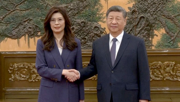 Cheng Li-wun, chairperson of the Kuomintang (KMT), Taiwans largest opposition party, shakes hands with Chinese President Xi Jinping at the Great Hall of the People in Beijing, China April 10, 2026. — Reuters