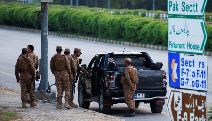 Army soldiers arrive at the D Chowk area, near the Presidents house, as Pakistan prepares to host the US and Iran for peace talks, in Islamabad, April 9, 2026. — Reuters