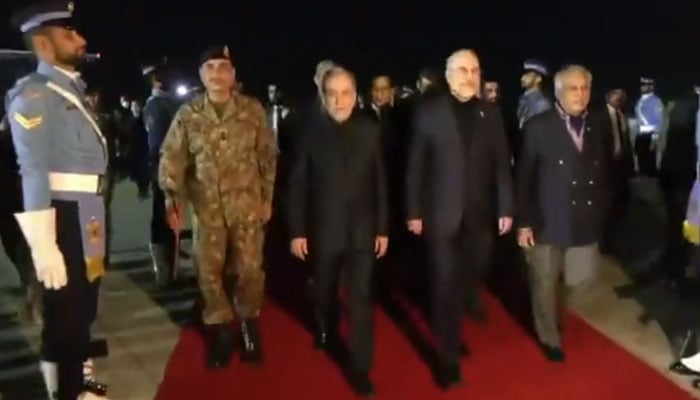 Deputy Prime Minister and Foreign Minister Senator Mohammad Ishaq Dar (right) and Chief of Defence Forces and Chief of Army Staff Field Marshal Syed Asim Munir (left) receive the Iranian delegation, including Iranian Parliament Speaker Mohammad Bagher Ghalibaf (centre-right) and Foreign Minister Abbas Araghchi (centre-left), Islamabad, April 11, 2026. — Screengrab via Geo News