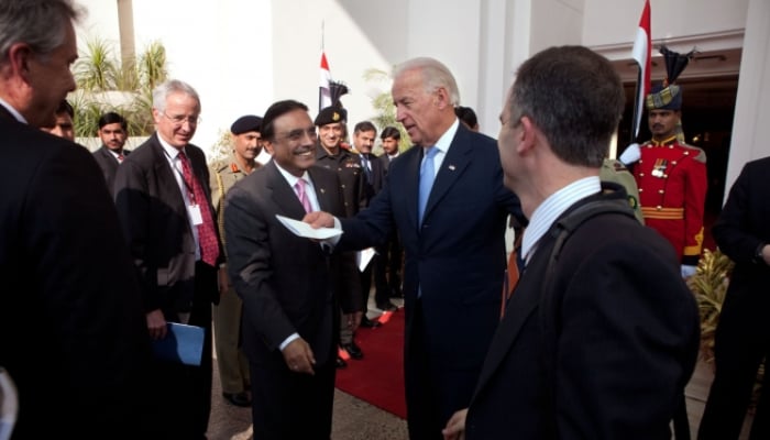 Then US Vice President Joe Biden greets Pakistani President Asif Ali Zardari and introduces him to Acting Special Representative Frank Ruggiero (right) outside the Presidential Palace in Islamabad, January 12, 2011. — The White House