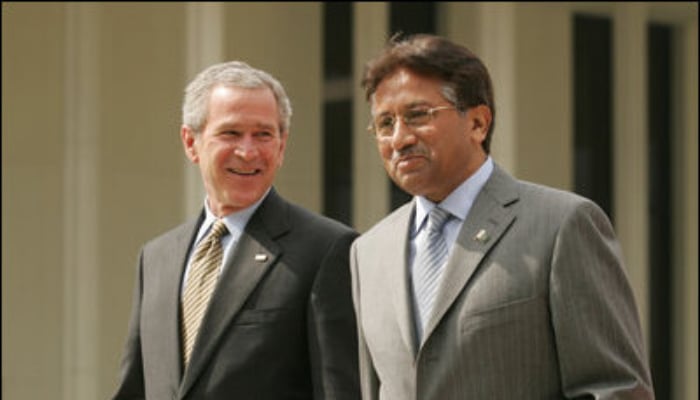 Former US President George W Bush (left) and ex-Pakistan President Pervez Musharraf walk together to their joint news conference at Aiwan-e-Sadr in Islamabad, Pakistan, Saturday, March 4, 2006. — The White House