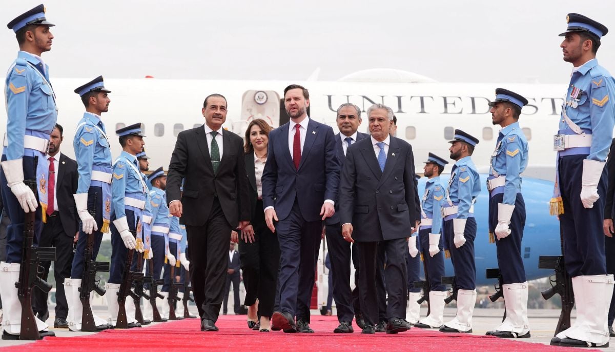 US Vice President JD Vance, walks with Chief of Defence Forces and Chief of Army Staff Field Marshal Asim Munir, Deputy Prime Minister and Foreign Minister Mohammad Ishaq Dar, Charge dAffaires of the US Embassy in Islamabad Natalie A Baker, and Interior Minister Mohsin Raza Naqvi, after arriving for talks with Iranian officials in Islamabad, Saturday, April 11, 2026. — Reuters