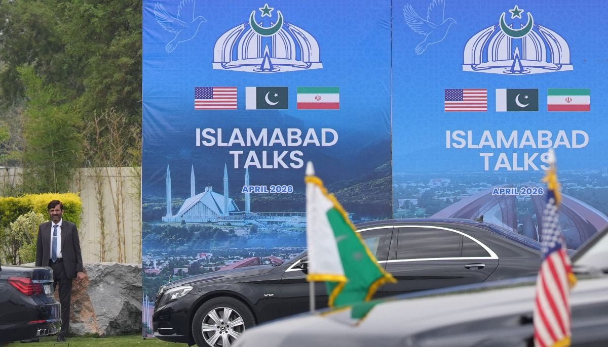 A Pakistani official stands during the arrival of the US Vice President JD Vance for talks with Iranian officials in Islamabad, Saturday, April 11, 2026. —Reuters