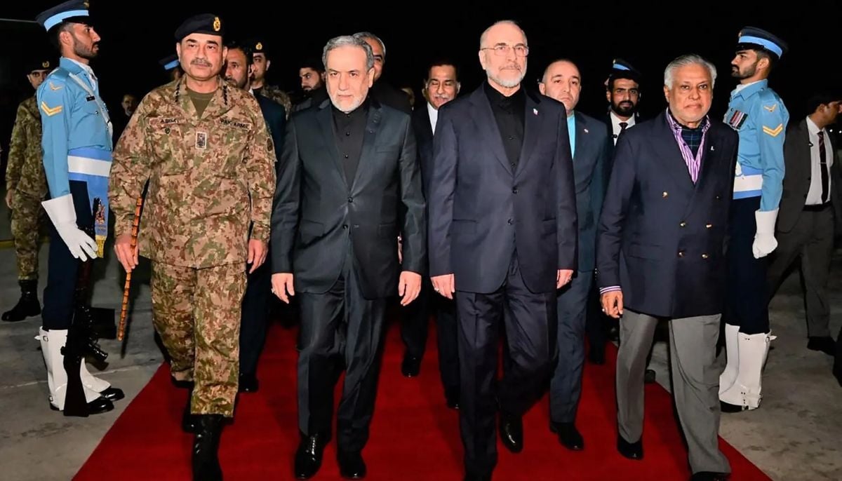 This handout photograph taken and released by Pakistan’s Ministry of Foreign Affairs on April 11, 2026 shows Pakistan’s Foreign Minister Ishaq Dar (2nd R) and Chief of Defence Forces (CDF) and Chief of Army Staff Field Marshal Asim (2nd L) walking with Iran’s Foreign Minister Abbas Araghchi (centre L) and Iran’s Parliament Speaker Mohammad Bagher Ghalibaf (centre R) upon their arrival at Nur Khan air base in Islamabad. —AFP