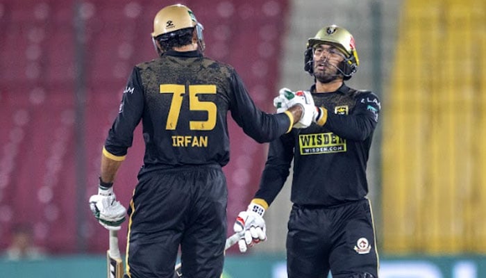 Hyderabad Kingsmens Muhammad Irfan Khan (left) and Hassan Khan bump fists during their PSL 11 match against Karachi Kings at the National Bank Stadium in Karachi on April 11, 2026. — PSL