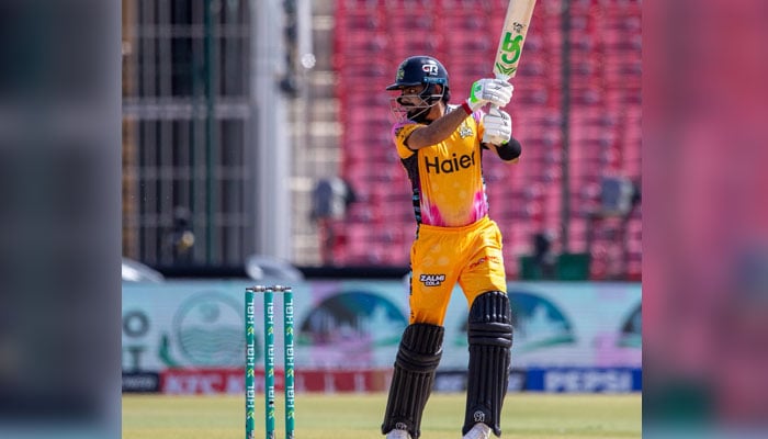 Peshawar Zalmi captain Babar Azam plays a shot during their Pakistan Super League (PSL) 11 match against Lahore Qalandars at the National Bank Stadium in Karachi on April 11, 2026. — PSL
