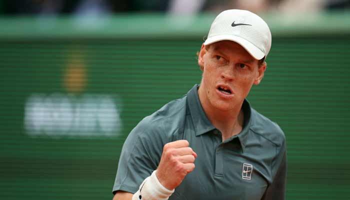 Italys Jannik Sinner reacts as he plays against Spains Carlos Alcaraz during the Monte Carlo ATP Masters Series Tournament final tennis match on Court Rainier III at the Monte-Carlo Country Club in Roquebrune-Cap-Martin, south-eastern France on April 12, 2026.— AFP