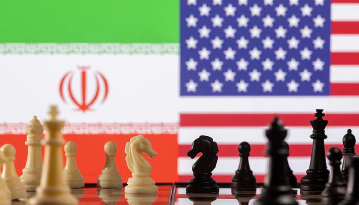 Chess pieces are seen in front of displayed Irans and U.S. flags in this illustration taken January 26, 2022. — Reuters