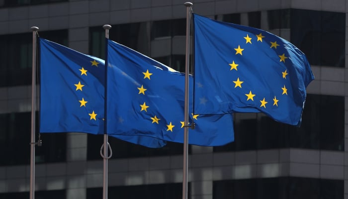European Union flags fly outside the European Commission headquarters in Brussels, Belgium, April 10, 2019. — Reuters