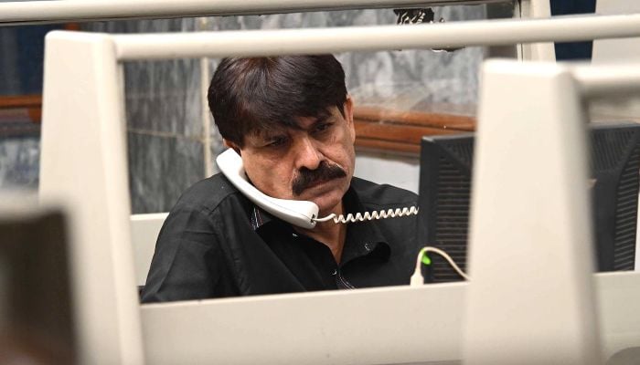 A trader monitors share prices at Pakistan Stock Exchange (PSX) in Karachi, Pakistan, 08 April 2026. — INP