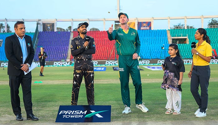 Peshawar Zalmi captain Babar Azam (centre-left) and Multan Sultans Ashton Turner (centre) at the toss for their PSL 11 match at the National Bank Stadium in Karachi on April 13, 2026. — PSL