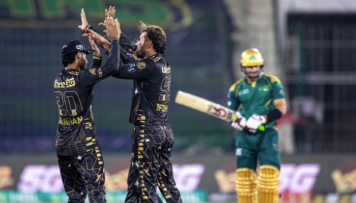 Peshawar Zalmis Iftikhar Ahmed (centre) celebrates with teammates after claiming a wicket during the PSL 11 match against Multan Sultans at the National Bank Stadium in Karachi on April 13, 2026. — PSL