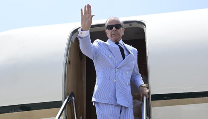 Prime Minister Shehbaz Sharif gestures as he departs on a visit to Turkiye from Lahore, on May 25, 2025. — Facebook@ShehbazSharif