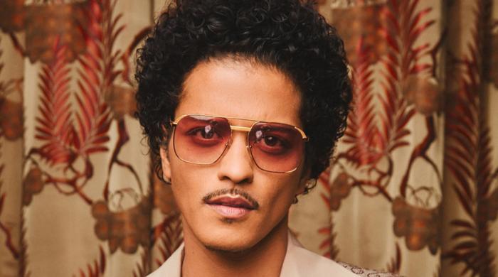 Bruno Mars jokes about being in $50 Million debt