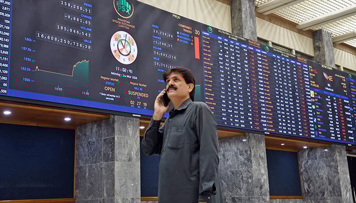 A trader monitors stock prices at the Pakistan Stock Exchange (PSX) in Karachi, on March 2, 2026. — Online
