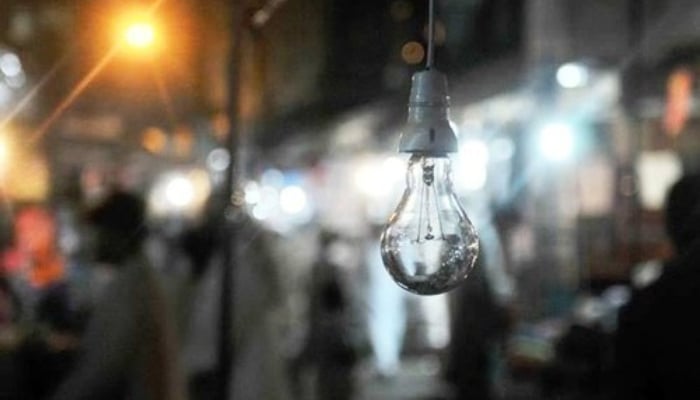 A representational image shows an unlit bulb symbolising power suspension. — AFP/File