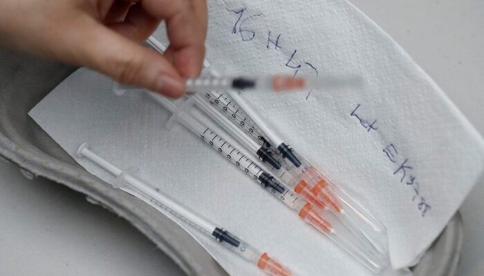Syringes containing a dose of the Pfizer-BioNTech Covid-19 vaccine are seen at the Cent Quatre cultural centre in Paris, France, February 1, 2021. — X/@Financegovpk