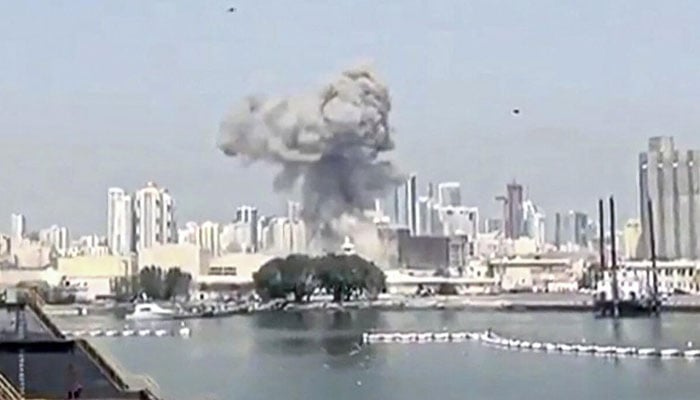 This video grab taken from UGC images posted on social media on February 28, 2026, and verified by AFPTV teams in Paris, shows the moment of an Iranian strike on a US base in Bahrain. — AFP