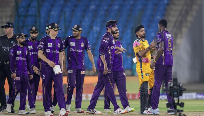 Peshawar Zalmi skipper Babar Azam shake hands with Quetta Gladiators players after winning the PSL 11 match at the National Bank Stadium in Karachi on April 15, 2026. — PSL