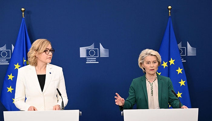 European Commission President Ursula von der Leyen and EU Executive Vice-President for Tech Sovereignty, Security and Democracy Henna Virkkunen (L) address a statement about the EU digital age verification app in Brussels on April 15, 2026. — AFP
