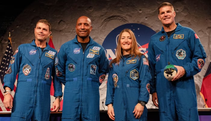 The four-member crew of the Artemis II Moon missions Orion capsule, Reid Wiseman, Victor Glover, Christina Koch and Jeremy Hansen, pose for a picture during a press conference at Nasas Johnson Space Centre in Houston, Texas, US April 16, 2026. — Reuters