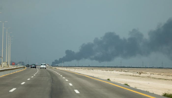 Smoke billows from Saudi Aramcos Ras Tanura oil refinery after a reported Iranian drone strike, amid the U.S.-Israel conflict with Iran, in Ras Tanura, Saudi Arabia, March 2, 2026. — Reuters
