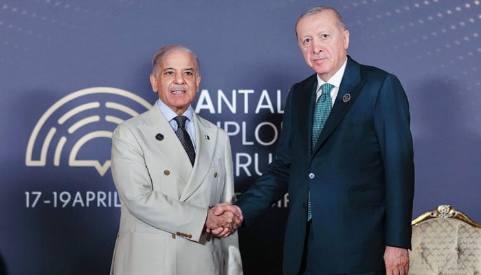 PM Shehbaz (left) meets Turkish President Erdogan on sidelines of the Antalya Diplomacy Forum on April 17, 2026. — X/@PakPMO