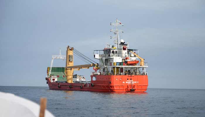 A vessel at the Strait of Hormuz, off the coast of Oman’s Musandam province, April 12, 2026. — Reuters/File