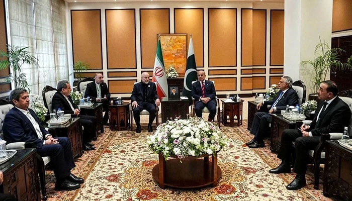 Prime Minister Shehbaz Sharif meets with Iranian Parliament Speaker Mohammad Bagher Ghalibaf, as delegations from the United States and Iran are expected to hold peace talks, in Islamabad, April 11, 2026. — Reuters