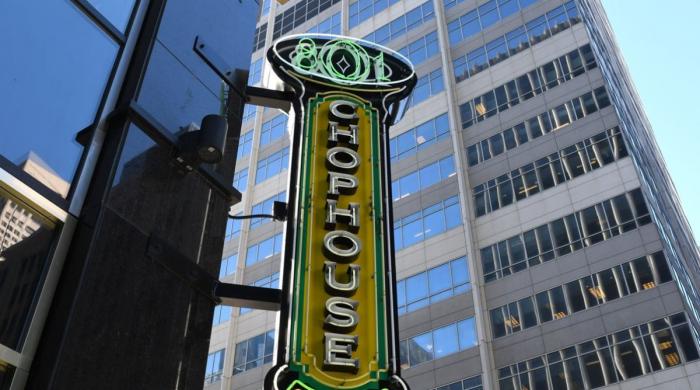 What led 801 Restaurant Group to file for Chapter 11 bankruptcy?