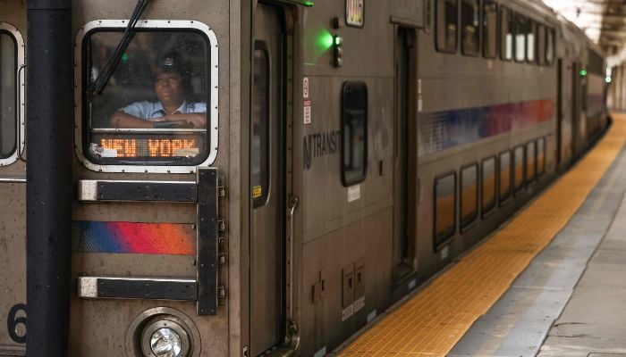 An NJ Transit train bound for New York pulls into Newark Penn Station in Newark, New Jersey on April 17, 2026. — AFP