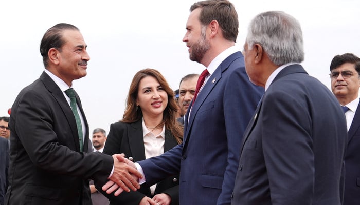 US Vice President JD Vance shakes hands with Chief of Defence Forces and Chief of Army Staff Field Marshall Asim Munir as Charge dAffaires of the US Embassy in Islamabad Natalie A. Baker and Deputy Prime Minister and Foreign Minister Mohammad Ishaq Dar look on, after arriving for talks with Iranian officials in Islamabad, Saturday, April 11, 2026. — Reuters