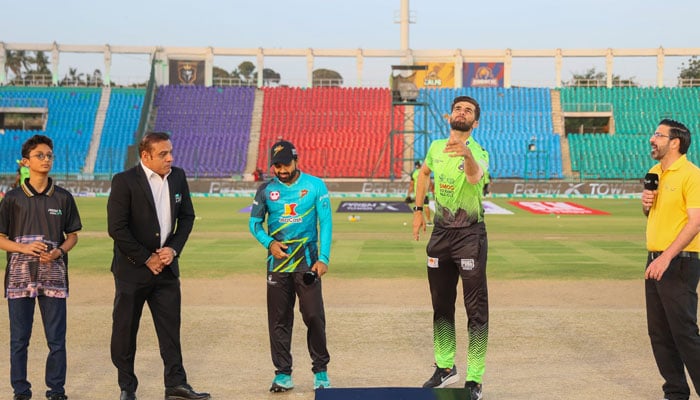 Lahore Qalandars captain Shaheen Shah Afridi (centre-right) flips the coin as Rawalpindiz captain Mohammad Rizwan (centre-left) looks on during the toss ahead of their PSL 11 match on April 18, 2026. X/@thePSLt20