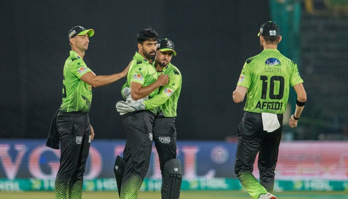 Lahore Qalandars players celebrate after dismissing Pindiz batter during their Pakistan Super League (PSL) 11 match at the National Bank Stadium in Karachi on April 18, 2026. — X/@thePSLt20