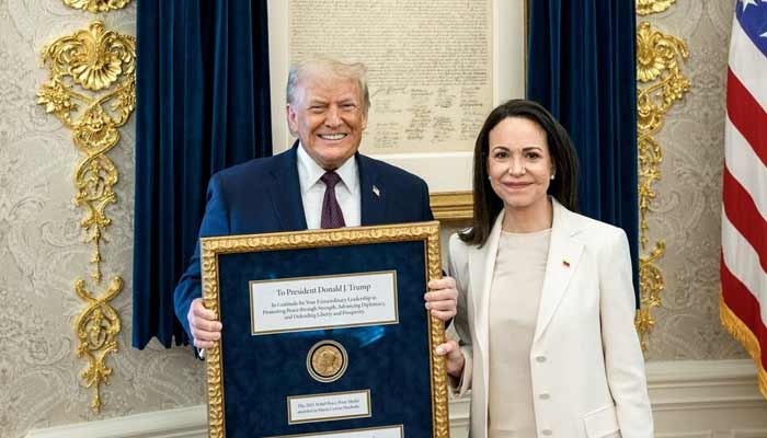 US President Trump meets with Venezuelan opposition leader Maria Corina Machado in the Oval Office, during which she presented the President with her Nobel Peace Prize, in Washington, DC, US, released January 15, 2026. — Reuters/File