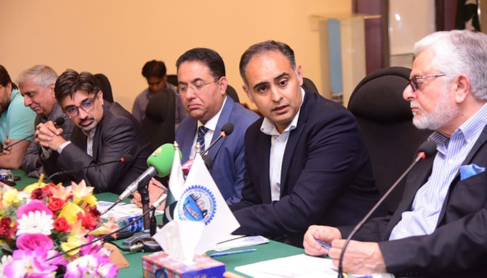 Minister of State for Finance Bilal Azhar Kayani speaks during consultative session at Karachi Chamber of Commerce and Industry, Karachi, April 18, 2026. — Ministry of Finance and Revenue
